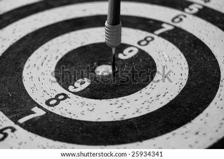 Target with dart arrow abstract sports background. Black and white.