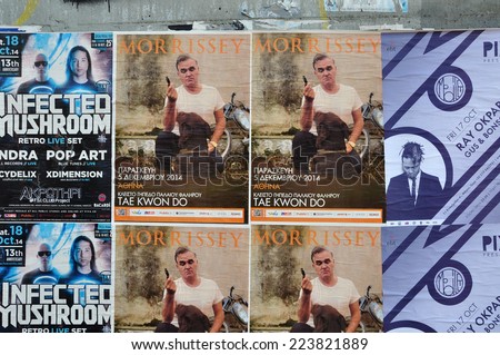 ATHENS, GREECE - OCTOBER 15, 2014: Wall with live music concert posters indie rock by Morrissey and dj sets of minimal techno by Ray Okpara and psychedelic trance by Infected Mushroom.
