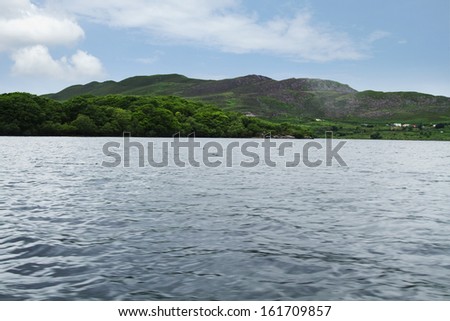 Lake with a mountain in the background, Lakes of Killarney, County Kerry, Republic of Ireland