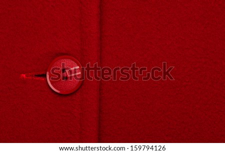 Button on red coat