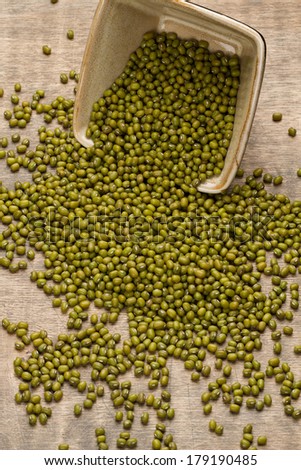 Mung beans on old wooden table