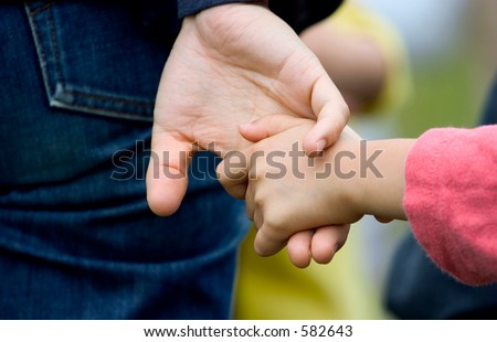 holding hands (mom and daughter)