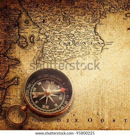 old compass on vintage map, 1740 Dania (author Ioh.Bapt.Homann) Nuremberg, Germany