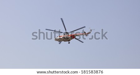 helicopter in blue sky