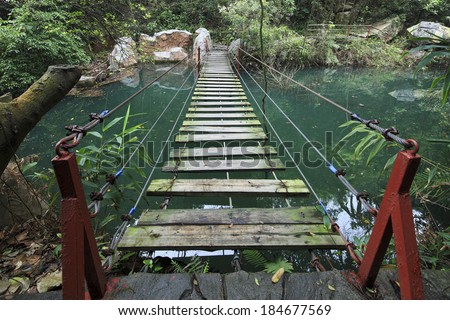 hanging bridge in forest when hiking outdoor