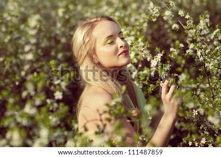 Nymph portrait, portrait of young woman at spring nature, portrait series of girls in nature
