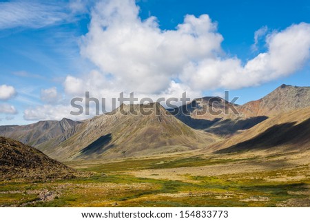 Mountain landscape with sky and clouds, Ural Mountains, Russia.