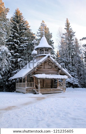 Wooden chapel on the fringe of the forest