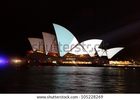 SYDNEY, AUSTRALIA - JUNE 11, 2012:  The Sydney Opera House becomes illuminated with spectacular visual art by various artists during the annual Vivid Sydney Festival on June 11, 2012
