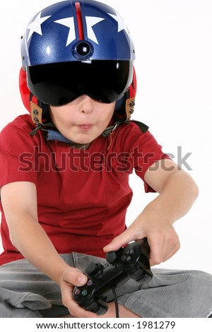 Child wearing helicopter pilot helmet with sunvisor and ear muffs, playing a flight simulator game.