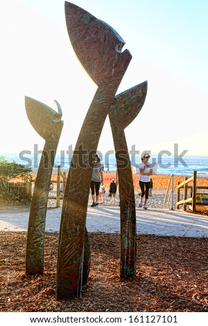 BONDI - TAMARAMA, AUSTRALIA - November 3, 2013: Sculpture By The Sea, Bondi 2013. Annual cultural event  Sculpture titled 'New Generation' by RM Gomboc (WA).  Medium copper  Price $69000