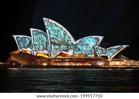 SYDNEY, AUSTRALIA - JUNE 2, 2014;  Sydney Opera House tiles fly off revealing the internal infrastructure architecture during Vivid Sydney annual festival