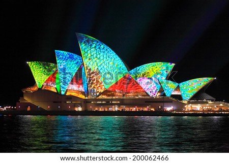 SYDNEY, AUSTRALIA - JUNE 2, 2014;  Sydney Opera House in bright colours during Vivid Sydney annual festival of light, music and ideas
