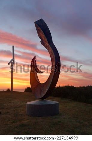 BONDI, AUSTRALIA - OCTOBER 23, 2014; Sculpture by the Sea Annual free public event 2014.  Exhibit titled The Moment by artist Ron Gomboc, WA,  The first glance that bonds mother to child.