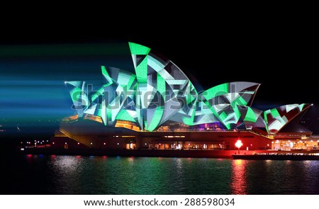 SYDNEY, AUSTRALIA - MAY 25, 2015;   Light beams stream onto the iconic landmark, the Sydney Opera House casting various moving patterns, like this geometric pattern during Vivid Sydney