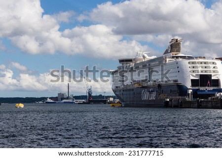 KIEL, GERMANY - SEPTEMBER 03 2014: Tests of the lifeboats and sea rescue exercises by Color Line Cruises on the Kiel Fjord