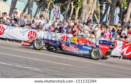 AZERBAIJAN, BAKU - JUNE 17: David Coulthard drive the RB7 of Red Bull Racing Team, Red Bull Showrun Parade, June 17, 2012 in Baku, Azerbaijan