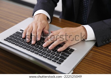 Men using a personal computer