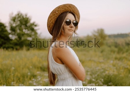 Similar – Image, Stock Photo Gorgeous teenager girl in a straw hat smiling. Portrait. Close-up Summer travel. Sale