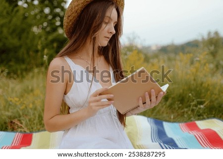 Similar – Image, Stock Photo read stories Wanderlust