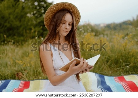 Similar – Image, Stock Photo read stories Wanderlust