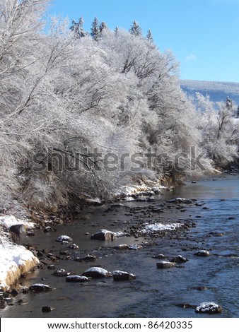 Aftermath of an early ice storm along a mountain river