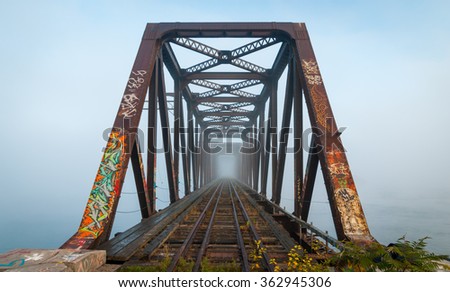 Similar – Image, Stock Photo Graffiti on a bridge: “Stop consuming”. Seen in Berlin / Photo: Alexander Hauk