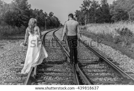 With Girl tied to tracks where All Girl tied to tracks