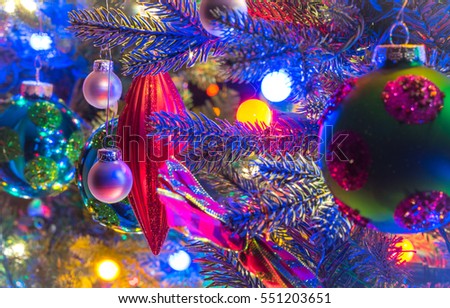 Christmas Tree Decorations Glowing Red Holiday Ornaments Hanging From Branches On A Small Christmas Tree Decorations Glowing Red Holiday Ornaments Hanging From Branches On A Small