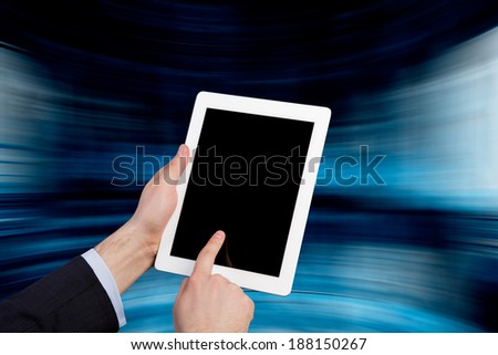 Digital gadget and hands.