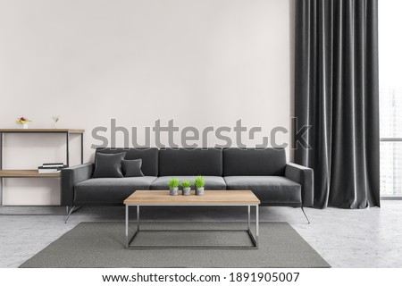 Living room with black sofa and wooden coffee table with plants, front view. White wall and curtains with window, furniture on parquet floor, 3D rendering no people