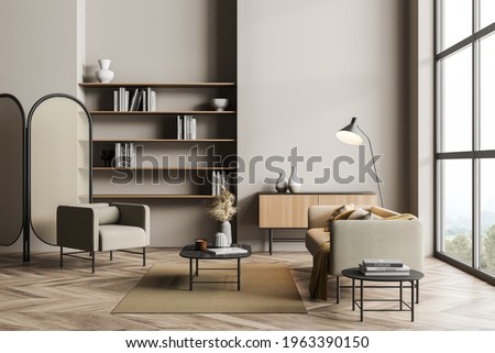 Wooden living room interior with armchair and couch with lamp, bookshelf rack and drawer with decoration, minimalist reading room on parquet floor, window with countryside. 3D rendering