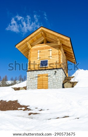 Wooden cottage in the mountains