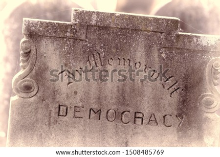 In Memory of democracy. Brexit referendum and USA presidential election concept image. Gravestone with the word democracy Political madness and modern politics gone bad. Failed democracy chaos concept Stock fotó © 