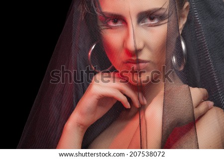Gothic style woman on black background. Professional art fashion make up. Dark bride