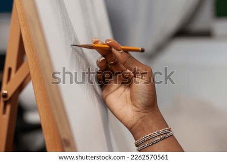 Similar – Image, Stock Photo Woman drawing with pencil in workshop