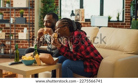 Similar – Image, Stock Photo African American woman eating strawberry