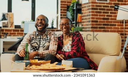 Similar – Image, Stock Photo Black woman enjoying fries and burger in restaurant