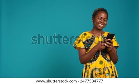 Similar – Image, Stock Photo Ethnic woman using smartphone on steps