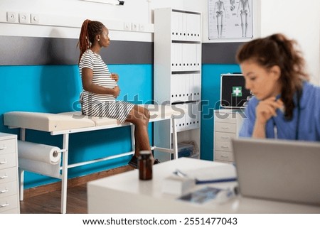 Similar – Image, Stock Photo Mother nursing while read a book