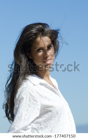 Foreground - Sweet face of a young girl Mediterranean