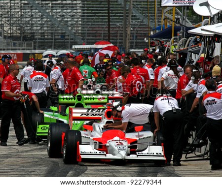 MILWAUKEE, WI - MAY, 29: INDYCAR cars and crew on pit lane before a race, May 29, 2009 in Milwaukee, WI.
