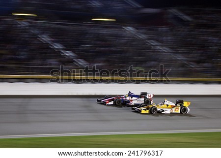 Newton Iowa, USA - June 23, 2012: Indycar Iowa Corn 250. Nightime racing action, under the lights, at Iowa Speedway. 14 Mike Conway Bromley, England ABC Supply Co./A.J. Foyt Racing
