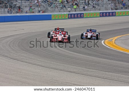 Milwaukee Wisconsin, USA - June 15, 2013: Indycar Indyfest race Milwaukee Mile. High speed racing action at 