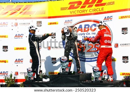 Milwaukee Wisconsin, USA - August 17, 2014: Verizon Indycar Series Indyfest. 1st Will Power,  gets champagne shower from Tony Kanaan and Juan Pablo Montoya