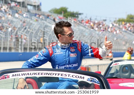 Milwaukee Wisconsin, USA - August 17, 2014: Verizon Indycar Series Indyfest ABC 250 Driver introductions. 7 Mikhail Aleshin (R) Moscow, Russia SMP Racing Honda Schmidt Peterson Motorsports