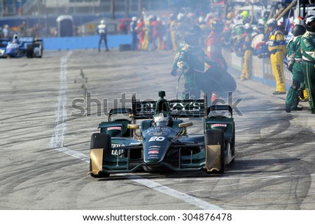 Milwaukee Wisconsin, USA - July 12, 2015: Verizon Indycar Series Indyfest ABC 250 at the Milwaukee Mile. Pit Stop action Ed Carpenter Indianapolis, Ind. Fuzzy\'s Vodka CFH Racing Chevrolet