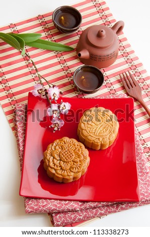 Chinese moon cake, food for Chinese mid-autumn festival and traditional tea.