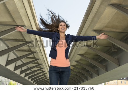 Happy self confident woman in urban environment, Outdoor Shot