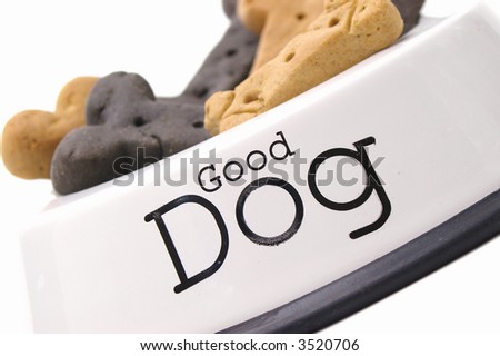 Designer dog treats in a bowl labeled 